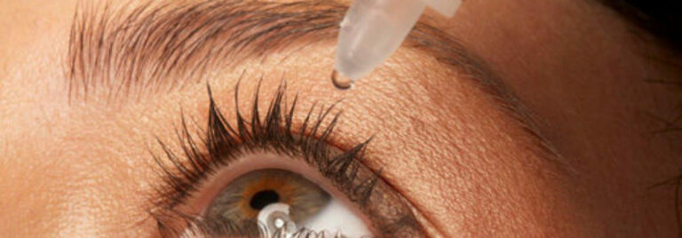 Woman using eye drops for dry eye