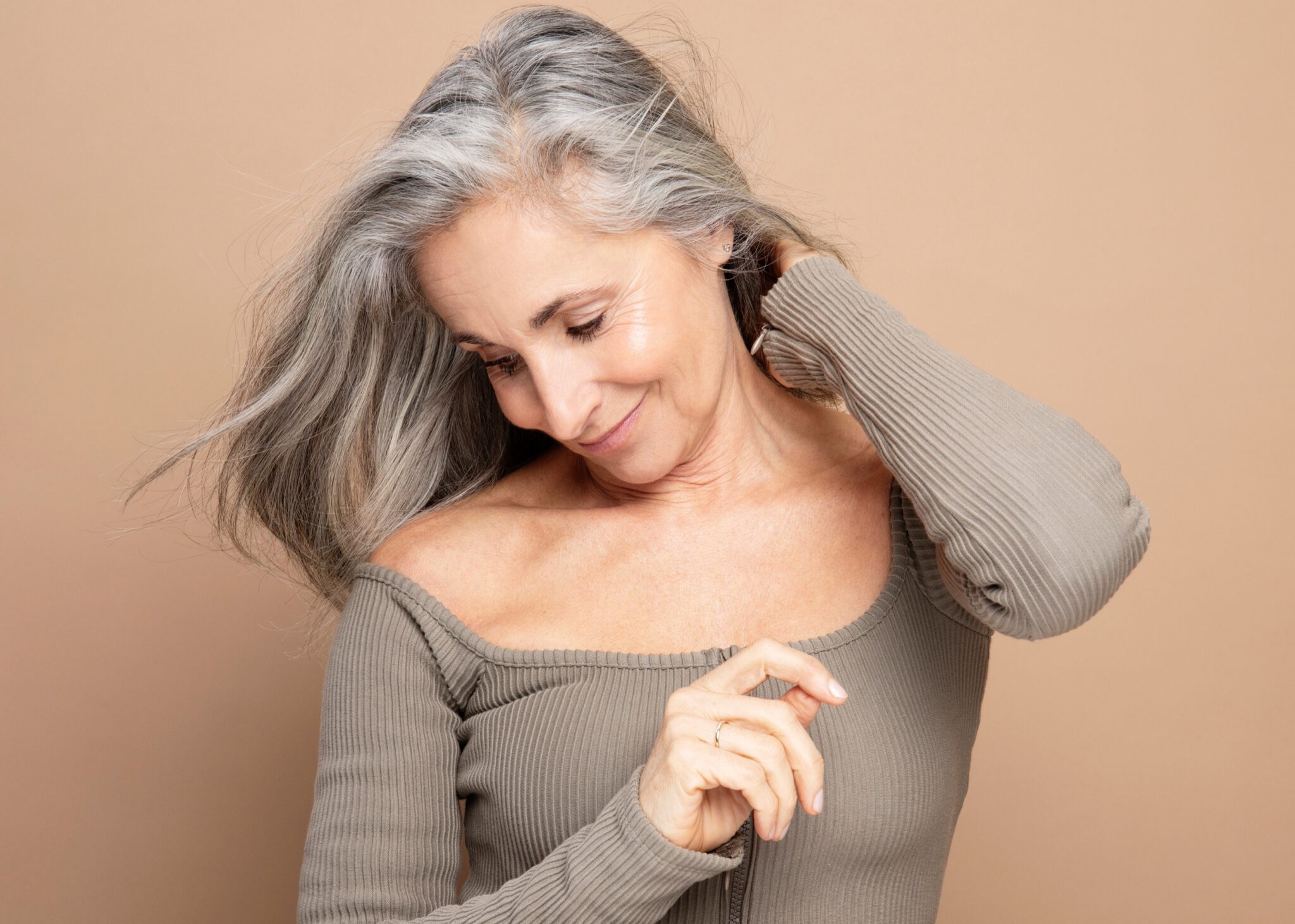 Happy mature Woman with beautiful skin and grey hair